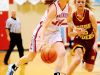 Ellie Brecht drives past Roosevelt's Kelsi Wipf during a game in Jan. 2014