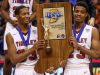 From left, Tindley Tigers’ Chris Murff (33) and Tyler Young (23) hoist the IHSAA Class A state championship trophy after their 51-49 win over the Lafayette Central Catholic Knights at Bankers Life Fieldhouse in Indianapolis on Saturday, March 25, 2017.