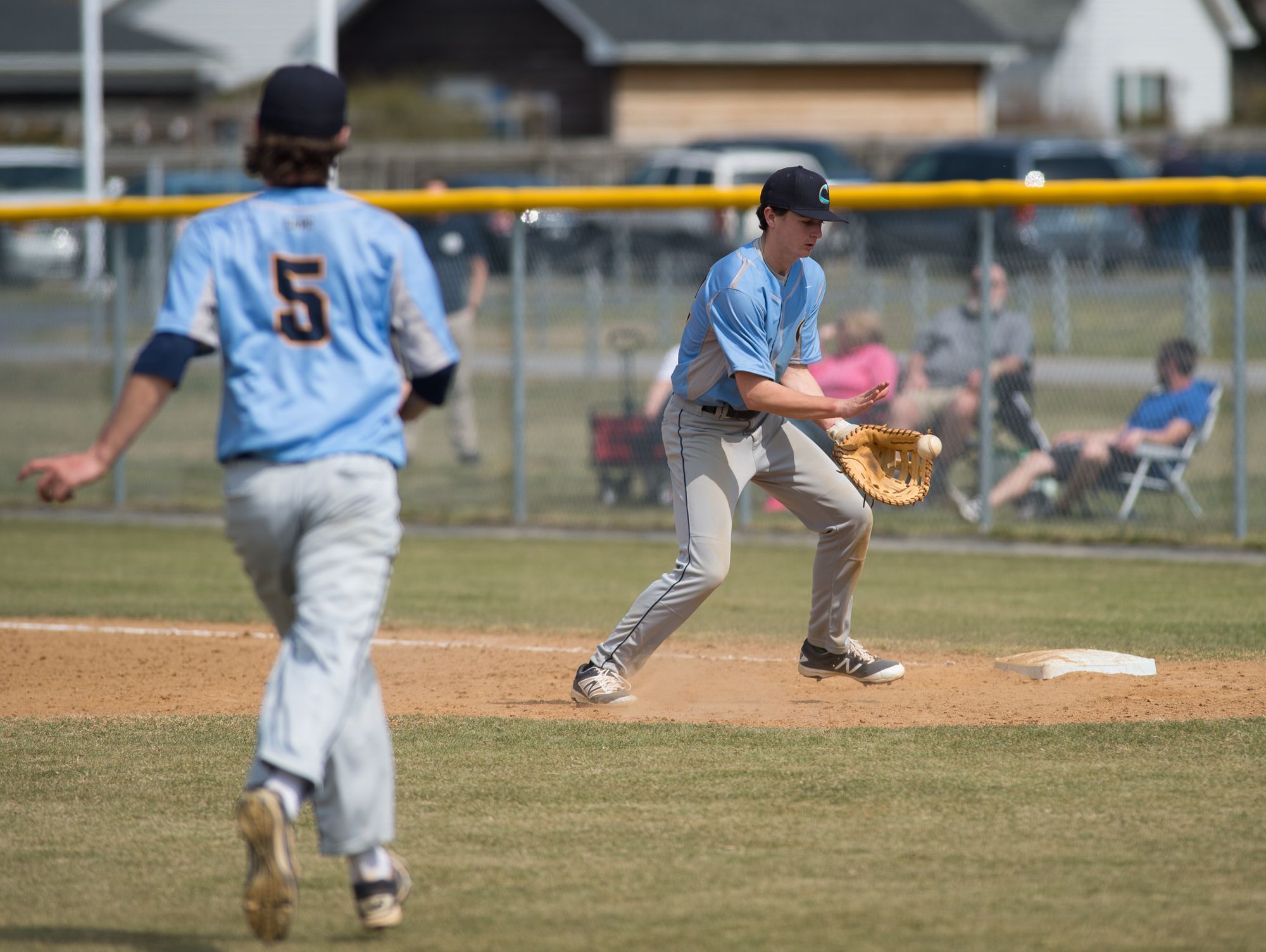 Cape Henlopen’s Connor Thompson (12) makes a out a first base in their home game against Caravel.