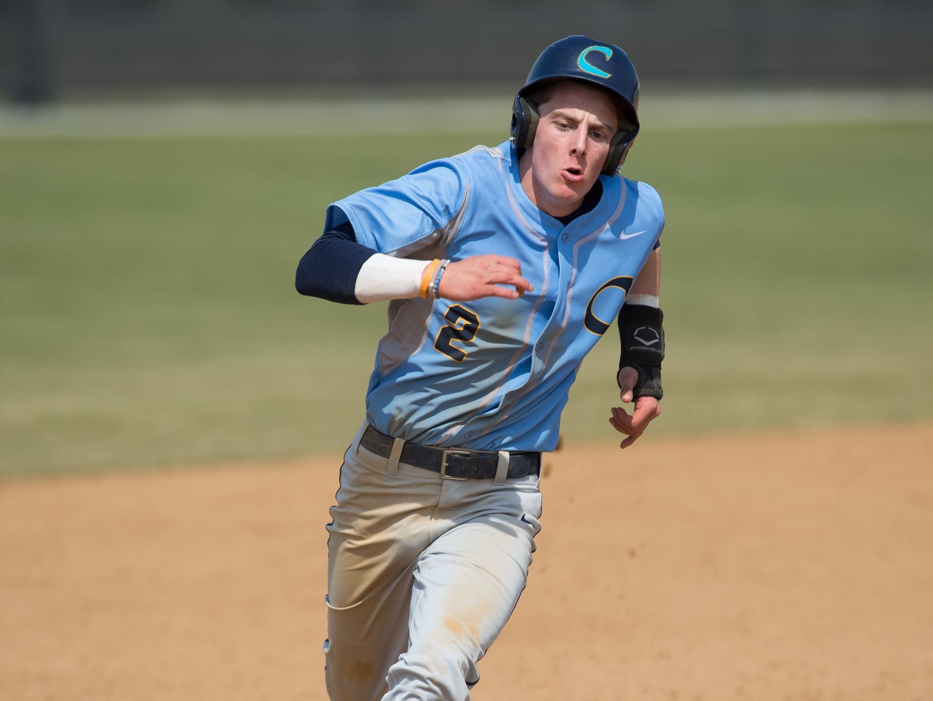 Cape Henlopen’s Zachary Savage (2) runs home to score their seventh run in their home game against Caravel.