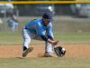 Cape Henlopen’s Dwayne Harmon (13) grabs a ground ball hit in their home game against Caravel.