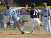 Cape Henlopen’s David Erickson (3) and Caravel’s Tyler Juhl (17) race to first base in the first inning during their game at Cape Henlopen High School.