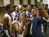 The Tindley Tigers take a selfie in the locker room after winning the IHSAA Class A state championship trophy game 51-49 over the Lafayette Central Catholic Knights at Bankers Life Fieldhouse in Indianapolis on Saturday, March 25, 2017.