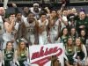 New Haven celebrates its Class C boys basketball state championship Saturday at Breslin Center.