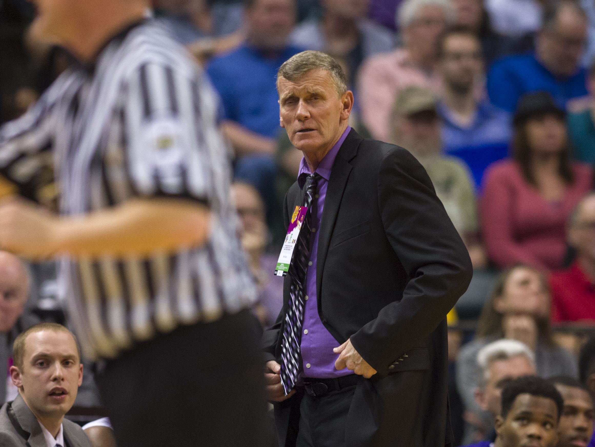 Ben Davis coach Mark James looks towards a game official as he reports the team's foul to the scorer's table during the first half of the IHSAA 2017 Class 4A State Championship Game at Bankers Life Fieldhouse Saturday.