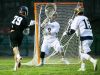 Josh Zawada of Hill Academy fires a shot at Salesianum goalie Brady Emmi for the first point of the game.
