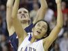 Appleton North’s Sydney Levy, rear, battles for a rebound against Annaly Garcia of Milwaukee King on Friday in Ashwaubenon.