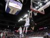 Ripon’s Bennett Vander Plas (1) dunks over Xavier’s Nate DeYoung (15) in a WIAA Division 3 semifinal at the boys basketball state tournament at the Kohl Center on Thursday.
