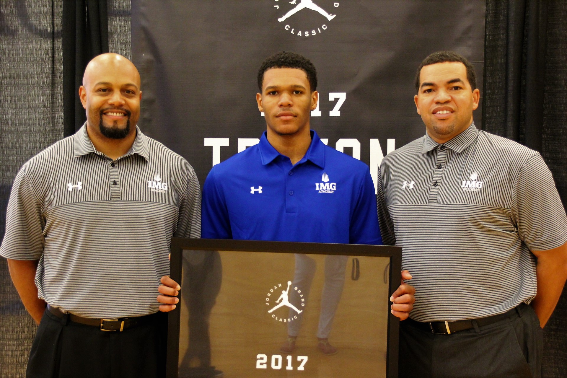 Trevon presented his coach, Vince Walden (right), with the Dream Champion Award. (Photo: Position Sports) 