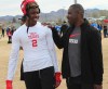 RJ Mickens and his father, Ray, share a moment last weekend during the Pylon 7on7 Las Vegas National Championships. RJ Mickens is a freshman at Southlake, Texas' Carroll High, where he had three interceptions and earned first-team all-district honors. (W.G. Ramirez)