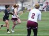 Arlington's Abby Carlin, center, takes the ball down the field during Saturday's game against Monroe-Woodbury.