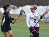Arlington's Rosie Debellis, right, tries to get closer to the net during Saturday's game against Monroe-Woodbury.