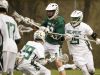 Tower Hill's William Corroon (center) works in his offensive zone in the second half of Archmere's 12-7 win Saturday. 22 25