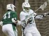 Tower Hill's Richard Corroon (left) gets the ball loose from Archmere's Mitchell Moyer in the second half of Archmere's 12-7 win Saturday.