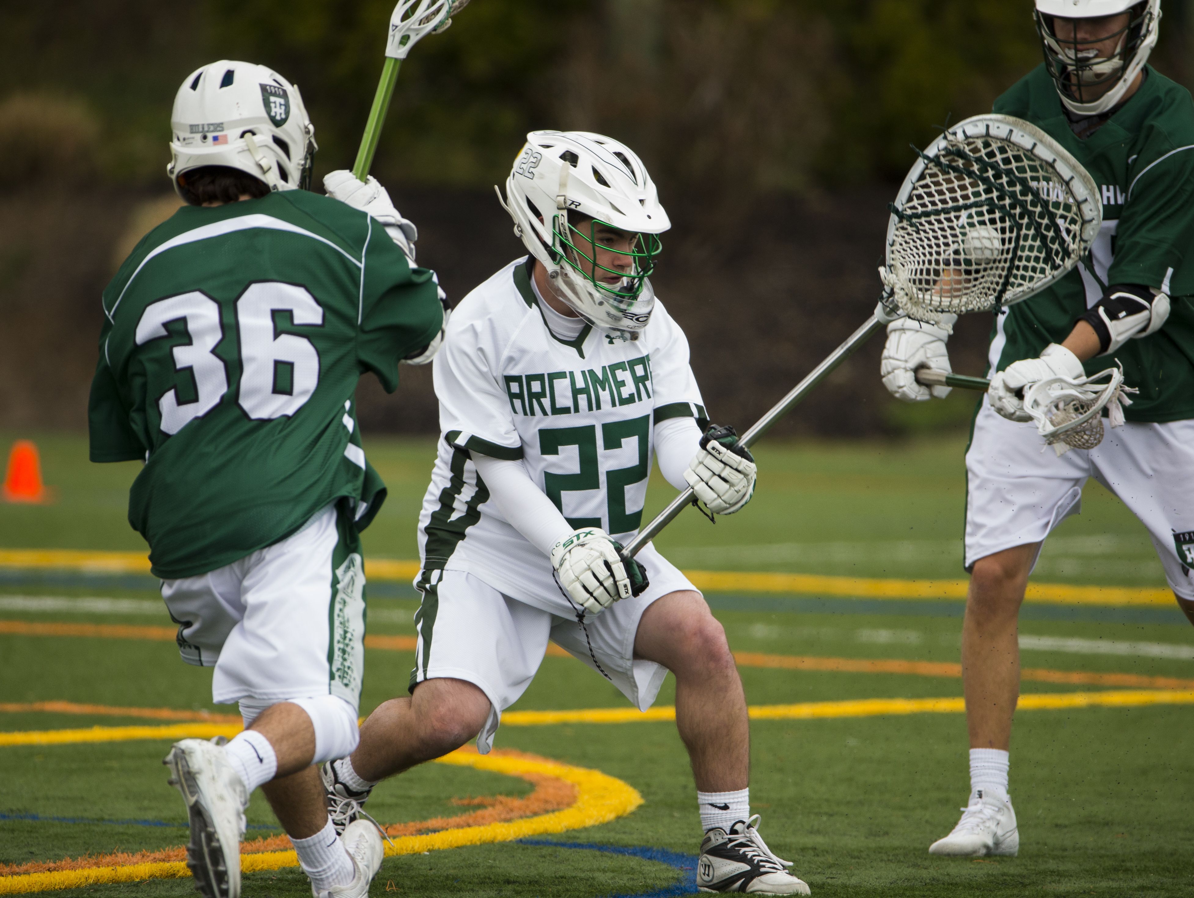 Archmere Connor Smeader goalie steps out of his crease to snag a loose ball in the second half of Archmere's 12-7 win Saturday.