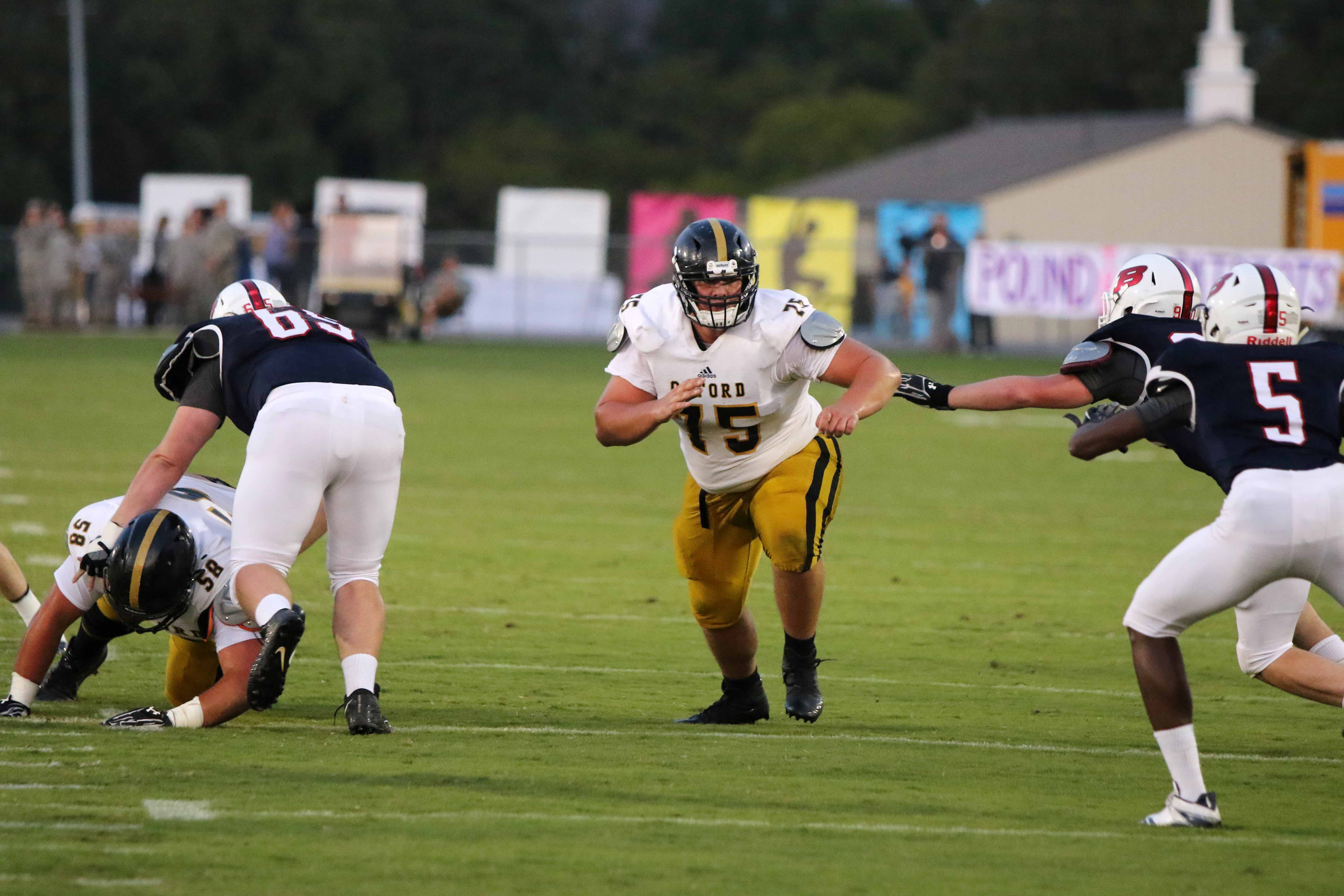 High school football players speak out: ‘Racism is very much alive’