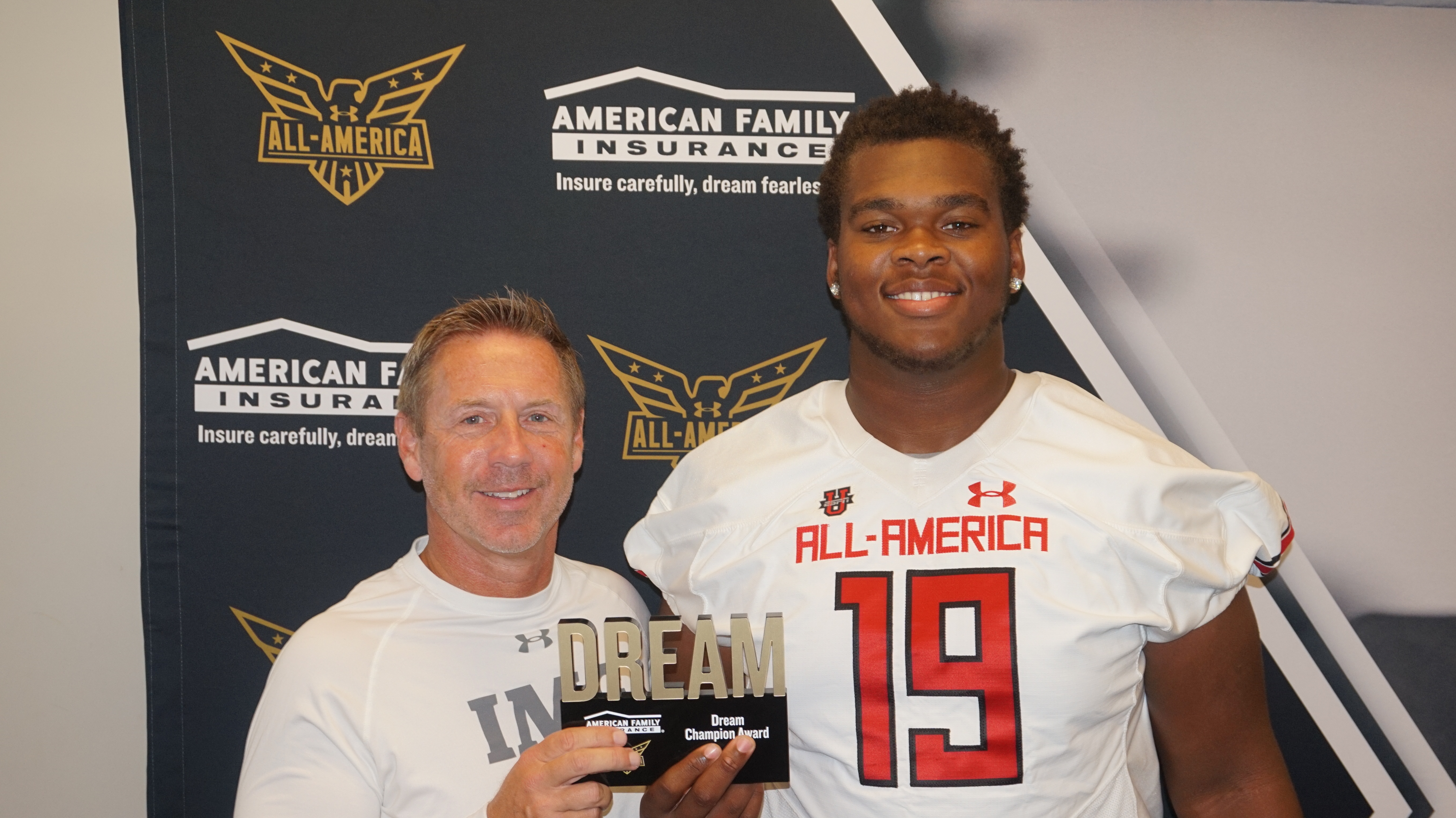 frequently Distract Woods IMG Academy players receive their Under Armour All-American jerseys